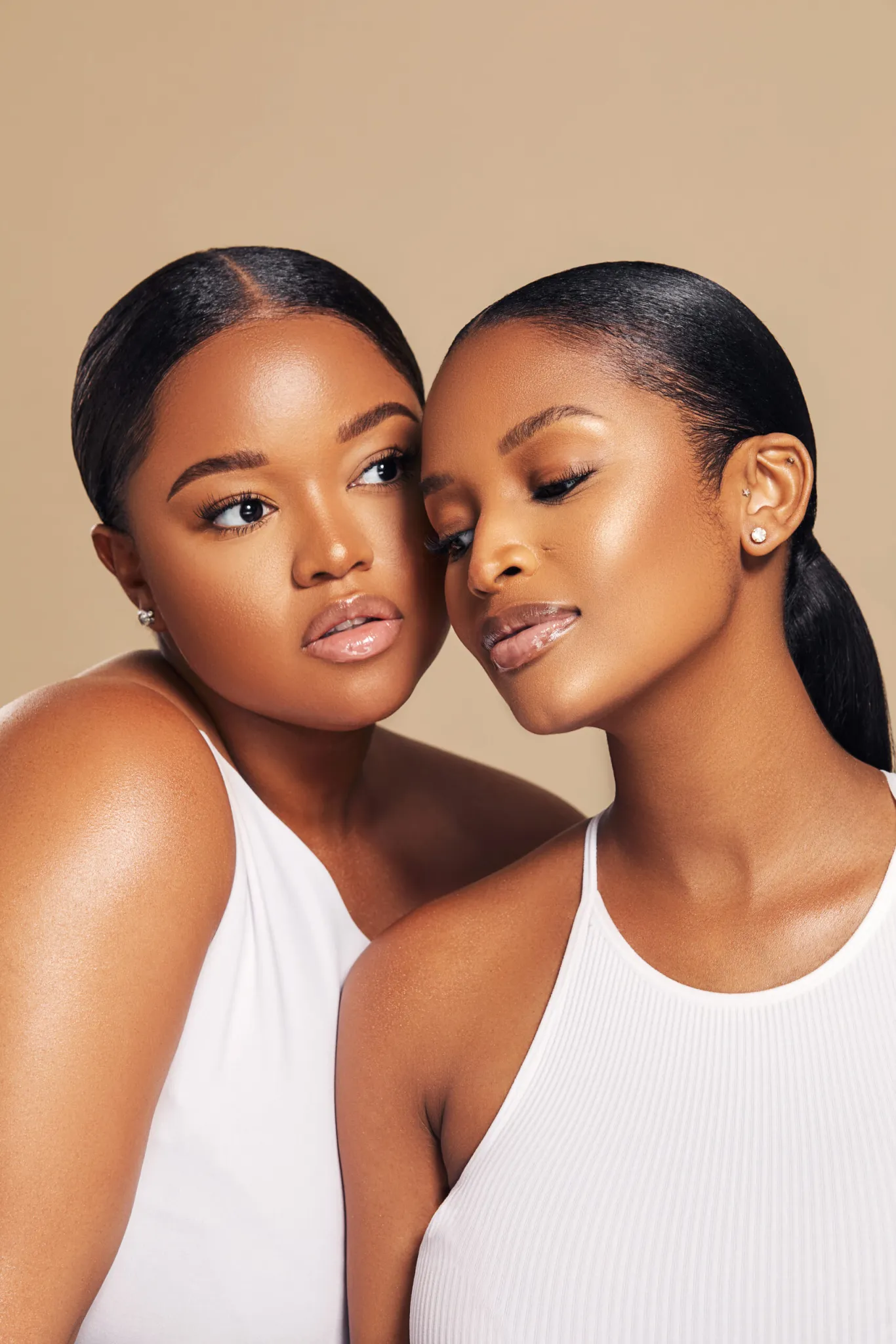 Glamour magazine's cover features Ayanda and Lungile Thabethe, who both look very stunning.