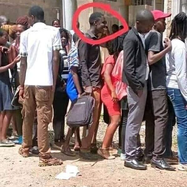 Mubobobo Man Caught Wearing C0ndom Rubbing His Trouser Snake On Woman's Back