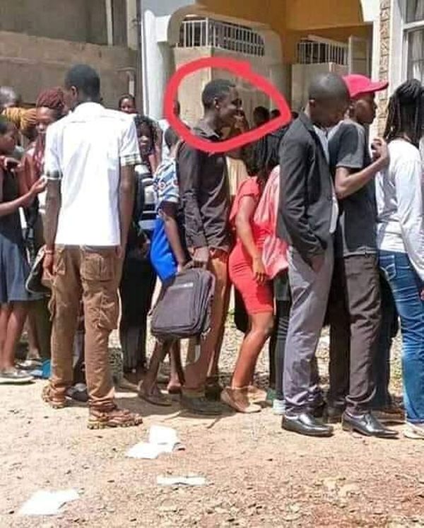 Mubobobo Man Caught Wearing C0ndom Rubbing His Trouser Snake On Woman's Back