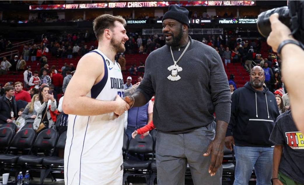 Dec 23, 2022; Houston, Texas, USA; Dallas Mavericks guard Luka Doncic (77) greets Shaquille O'Neal after the game against the Houston Rockets at Toyota Center. Mandatory Credit: Troy Taormina-USA TODAY Sports/File Photo