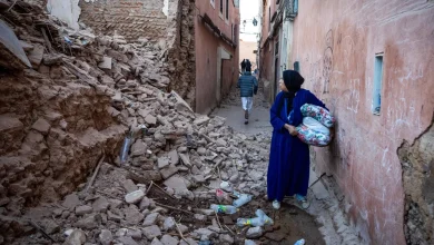 A woman stands among the rubble of a building in the earthquake-damaged old city of Marrakech. Fadel Senna/AFP/Getty Images