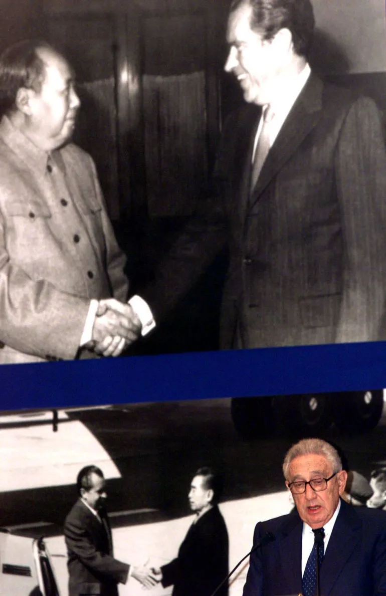 In 2002, former US Secretary of State Henry Kissinger celebrated the 30th anniversary of President Richard Nixon’s meeting with China’s Mao Zedong in 1972 to normalise US-China relations [File: China Photo/via Reuters]
