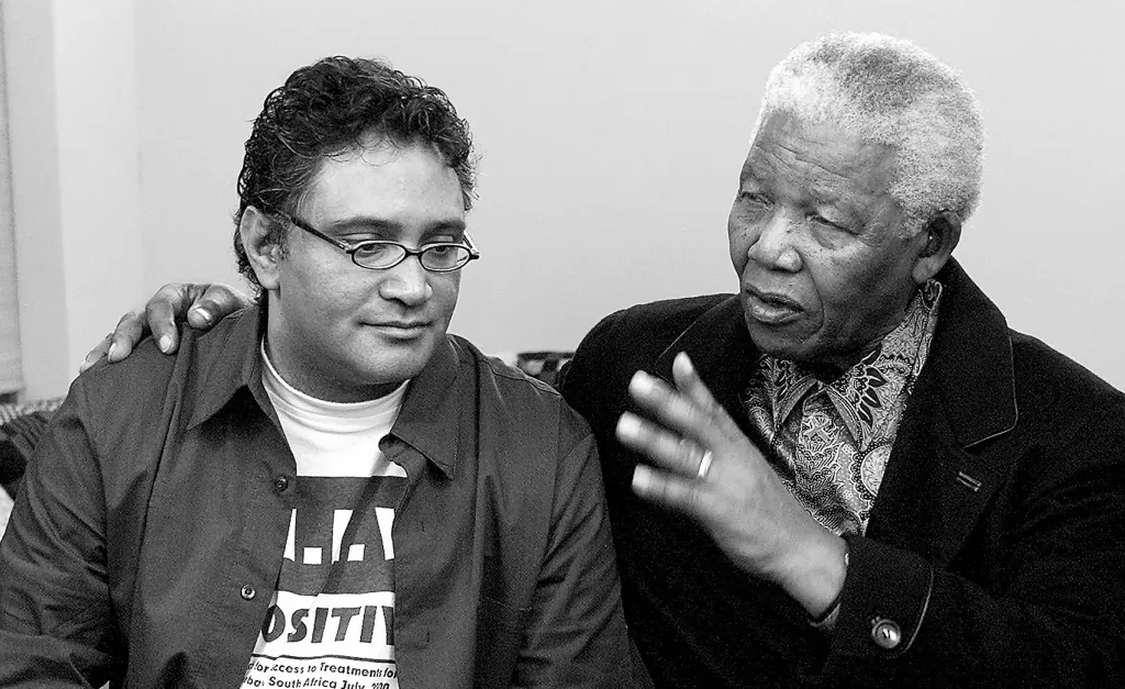 JOHANNESBURG, SOUTH AFRICA – July 27, 2002: Former President Nelson Mandela with Aids treatment activist Zackie Achmat. Both of these public figures have become powerful forces in South Africa’s battle against Aids. (Photo: Gallo Images via Getty Images/Sunday Times/Terry Shean)