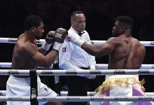 Anthony Joshua knocked Francis Ngannou outSTRAP