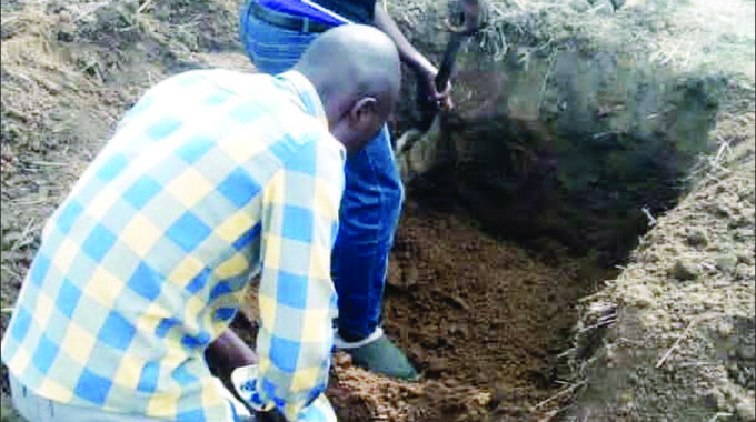 Prof Muwati grave during the exhumation process